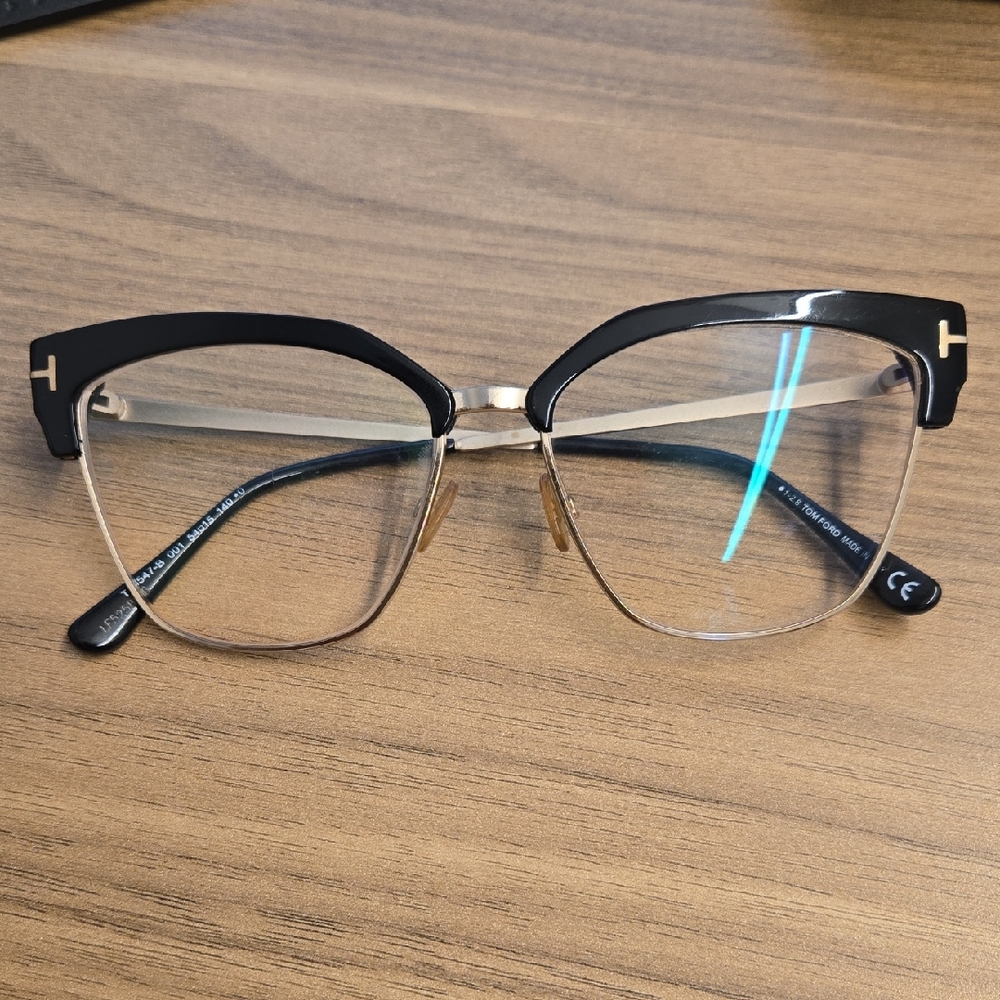 Tom Ford Elegant Black and Gold Women's Glasses
